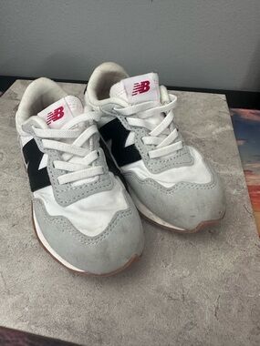 New Balance Kids White, Gray & Black Athletic Sneakers with Pink Logo